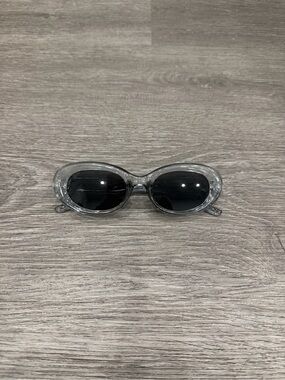 Oval Clear Frame Sunglasses with Black Lenses